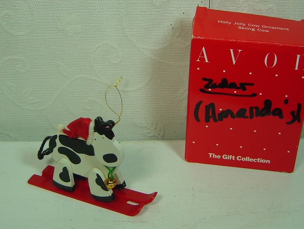 AVON ORNAMENT-HOLLY JOLLY SKIING COW WITH BOX
